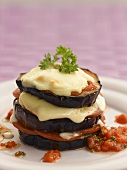 Aubergine tower with tomato sauce and toasted mozzarella