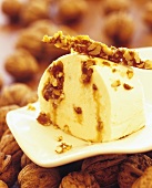 Vanilla and walnut parfait with walnuts in background