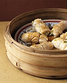 Steamed fish rolls filled with vegetables