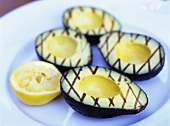 Barbecued avocado halves on a plate