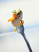 Chicken with vegetables on a fork