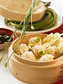 Stuffed Chinese rice balls in steaming basket