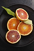 Blood orange halves ('Tarocco' variety) in a bowl