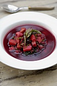Beetroot soup in a soup plate