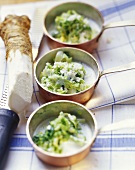 Kale and savoy cabbage with horseradish in small pans