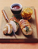 Roast bacon-wrapped chicken breast with barbecue sauce