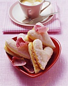 Puff pastry hearts with pink icing