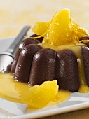 Chocolate semolina pudding with orange sauce (lactose- & egg-free)