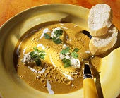 Orange and carrot soup with veal dumplings