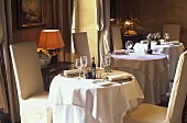 Tables in restaurant 'La Mirande', Avignon, France