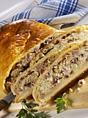 Potato pastry with onion and duck breast filling