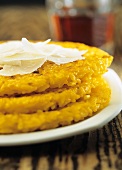 Risotto a frittelle (Saffron rice cakes with Parmesan shavings)