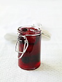 Strawberry jam in preserving jar