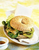 Bagel with kiwi fruit and Appenzeller cheese