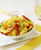 Potato salad with cheese and peppers