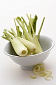 Baby fennel in a small bowl
