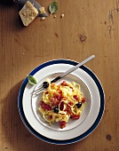 Tagliatelle with tomatoes and olives