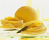 Still life with pasta dough and ribbon pasta