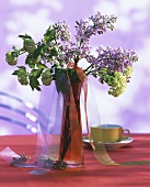 Vase of lilac and Viburnum