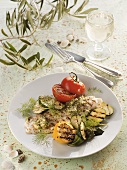 Grilled pangasius fillet and vegetables with dill pesto