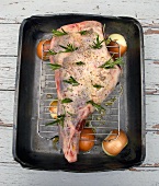 Leg of lamb studded with rosemary