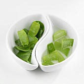 Pieces of Aloe vera leaves in a small bowl