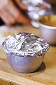 Fruit pudding, sealing basins with aluminium foil