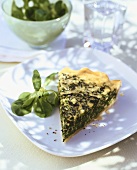 A piece of spinach and Parmesan tart