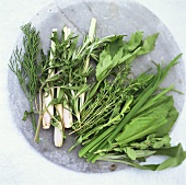 Assorted fresh herbs in a dish
