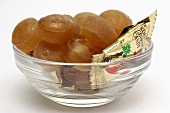 Ginseng sweets in a small glass bowl
