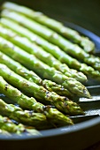 Green asparagus in grill pan