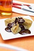 Puff pastry parcel with cherry & cream filling, chocolate sauce
