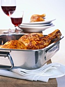 Roast chicken in roasting tin