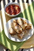 Vietnamese spring rolls with chili sauce