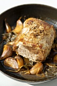 Roast loin of pork with garlic and sage