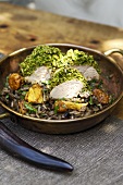 Pheasant breast with pistachio crust on mushroom risotto