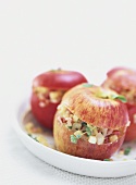 Apples stuffed with bacon, onions and marjoram