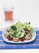 Summer salad with raspberries and fried veal sweetbreads