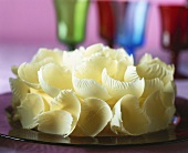White chocolate curls on a plate
