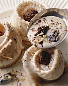 Steamed sole rolls with morel cream sauce and nuts