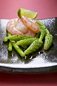 Shrimp tails with wild asparagus and lime