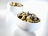 Capers in two small bowls