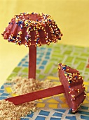 Fruit ice lollies with sprinkles
