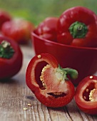 Red cherry peppers in a basin