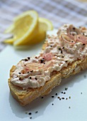 Salmon and soft cheese spread on bread
