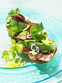 Salad and avocado open sandwich