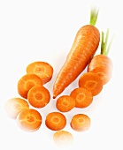 Two carrots, whole and sliced