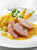 Smoked, cured pork with mashed potato & carrots & mustard sauce