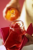 Pouring orange juice into a glass