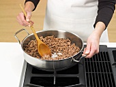 Sautéing mince in a frying pan